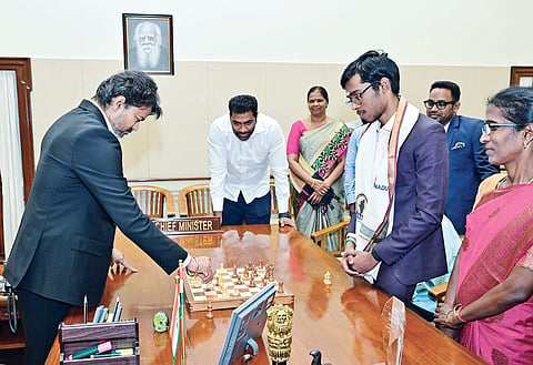 CM Vijay playing chess with Praggnanandhaa