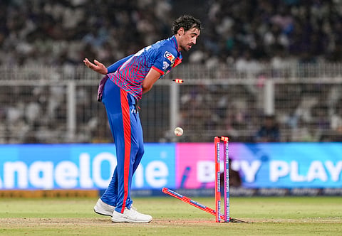Kolkata: Delhi Capitals' Mitchell Starc takes a wicket of Kolkata Knight Riders' Anukul Roy during an Indian Premier League (IPL) 2026 T20 cricket match between Kolkata Knight Riders and Delhi Capitals, in Kolkata, West Bengal, Sunday, May 24, 2026. 