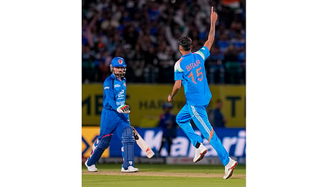 India's Harsh Dubey, right, celebrates with Gurnoor Brar after taking the wicket of Afghanistan's captain Hashmatullah Shahidi during an ODI cricket match between India and Afghanistan, in Dharamshala, Himachal Pradesh, Saturday, June 13, 2026