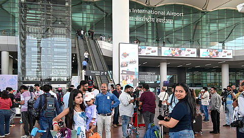 Passengers arrive at the Noida International Airport, in Jewar, Uttar Pradesh