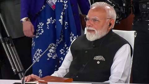 Prime Minister Narendra Modi attends a working session at the G7 Summit, in Evian-les-Bains