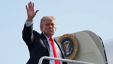 President Donald Trump boards Air Force One at Ocala International Airport, in Ocala Fla
