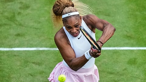 Serena Williams of the US returns the ball as she and Czech Republic's Karolina Muchova play during their round of 16 doubles match against New Zealand's Erin Routliffe and Mexico's Giuliana Olmo 