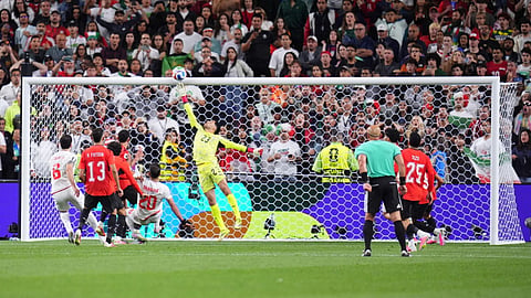 Egypt goalkeeper Mostafa Shoubir (23) jumps to save a shot at goal during the World Cup Group G soccer match between Egypt and Iran in Seattle.