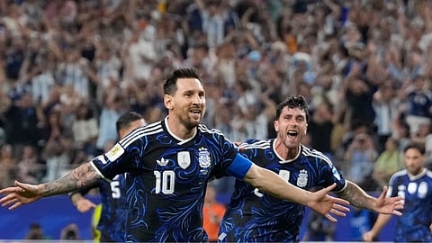 Argentina's Lionel Messi (10) celebrates scoring his side's 3rd goal during the World Cup Group J soccer match between Jordan and Argentina in Arlington, Texas, near Dallas