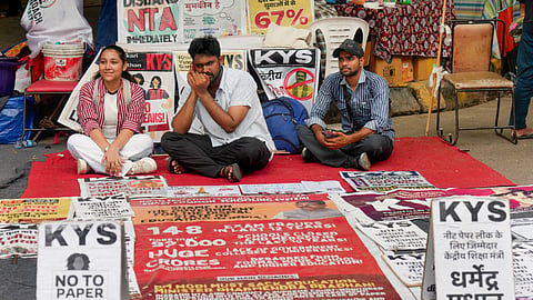 Cockroach Janata Party (CJP) supporters protest to press for Union Education Minister Dharmendra Pradh's resignation over alleged examination irregularities, at the Jantar Mantar in New Delhi