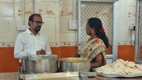 Minister P Venkataramanan inspecting Amma Unavagam at Santhome High Road in Chennai.