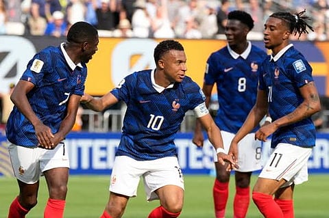 Kylian Mbappe of France celebrates scoring his team's third goal during the FIFA World Cup 2026 Round Of 32 match between France and Sweden at New York New Jersey Stadium.