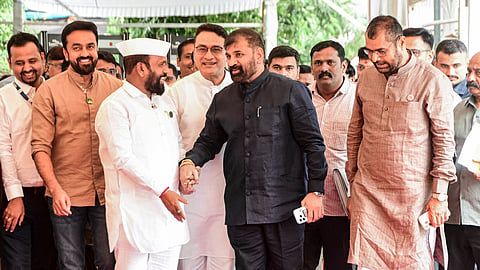 Shiv Sena (UBT) MLC Sachin Ahir, centre, arrives during Monsoon session of the Maharashtra Assembly, in Mumbai, Wednesday, July 1, 2026. Ahir was elected unopposed to the post of deputy chairman of the Maharashtra legislative council as a candidate of the ruling Mahayuti on Wednesday