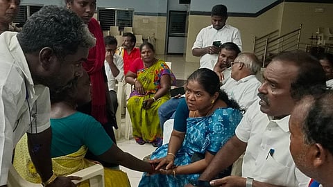 CPM state executive committee member K Samuelraj with the slain Dalit youth's parents in Mayiladuthurai 