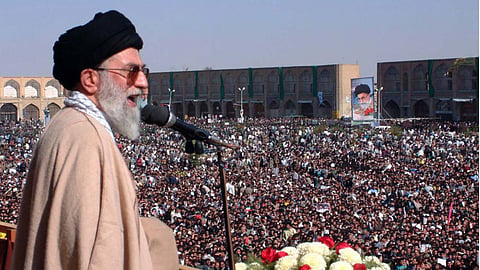 Ayatollah Ali Khamenei, then Iran's supreme leader, addresses thousands gathered at Imam Square in Isfahan, Iran