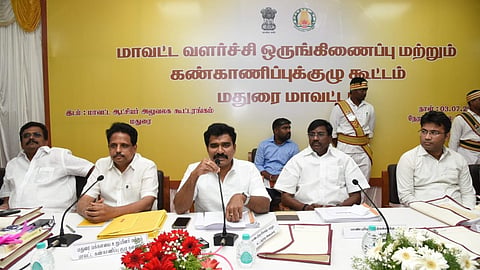 Law Minister R Nirmalkumar chairing a district coordination meeting in Madurai on Friday