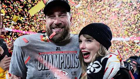 Travis Kelce, left, and Taylor Swift pose after the AFC Championship NFL football game against the Buffalo Bills