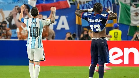 Cape Verde's Sidny Lopes Cabral (13) and Argentina's Lionel Messi (10) react after the World Cup round of 32 soccer match between Argentina and Cape Verde
