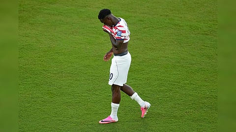United States’ Folarin Balogun (20) reacts to a red card during the World Cup round of 32 soccer match between the United States and Bosnia in Santa Clara, Calif., near San Francisco.