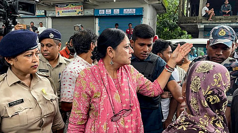 BJP leader Agnimitra Paul speaks with the family members of a 12-year-old girl who was allegedly gang-raped and murdered, during her visit to Baruipur, in South 24 Parganas district, West Bengal, Tuesday, July 7, 2026.