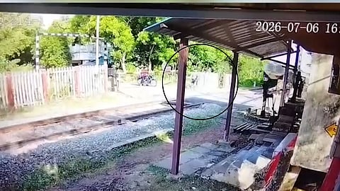 Screen grab of railway gatekeeper saves a man near Sirkazhi