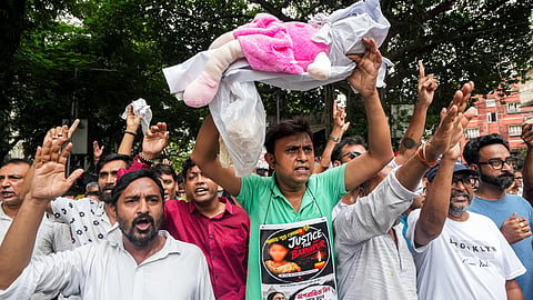 TMC workers stage a protest march over the rape and murder of an 11-year-old girl in Baruipur, in Kolkata, Wednesday, July 8, 2026