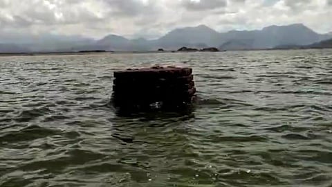 The single tower of St Lourdes Church reappears in the reservoir area on Wednesday 