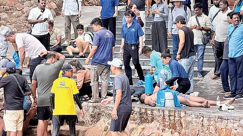 People help victims of the boat accident in southern Vietnam’s An Giang Province on Juky 11.