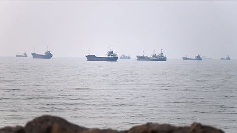 Commercial vessels are seen in the Strait of Hormuz off Bandar Abbas, Iran.