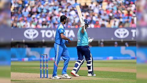 England's Liam Dawson celebrates a half century during the first ODI cricket match between England and India in Birmingham, England.