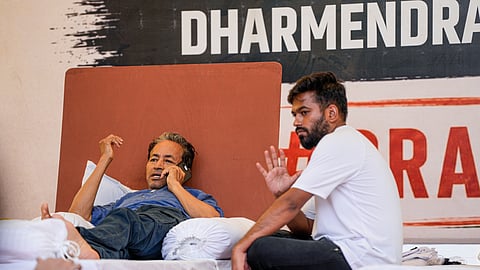 Climate activist Sonam Wangchuk with Cockroach Janata Party (CJP) founder Abhijeet Dipke during a hunger strike demanding action over alleged irregularities in examinations and seeking the resignation of Union Education Minister Dharmendra Pradhan, at Jantar Mantar