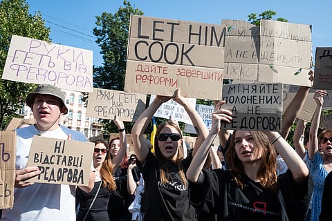  Kyiv where protesters have gathered after Ukrainian President Volodymyr Zelenskyy moved to dismiss his defense minister as the parliament convened to appoint a new prime minister.