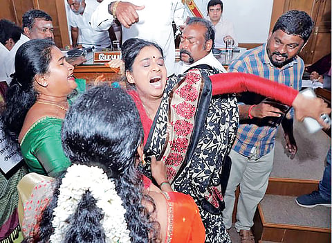 DMK councillors ghearao Cong’s Gayathri during council meeting