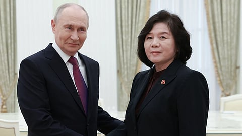 Russian President Vladimir Putin shakes hands with North Korean Foreign Minister Choe Son Hui during their meeting at the Kremlin in Moscow.
