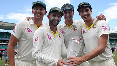 Australian bowlers Josh Hazlewood, left, Nathan Lyon, Mitchell Starc, second right, and Pat Cummins, right,