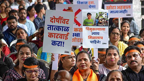 MNS workers hold a protest over the June 30 Chembur tree crash that killed an 11-year-old student, at Azad Maidan in Mumbai, Wednesday, July 22, 2026