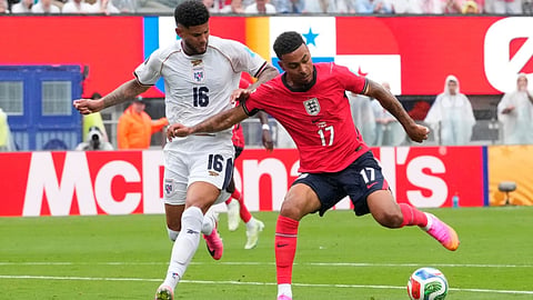 England’s Morgan Rogers (17) and Panama’s Andres Andrade (16) battle for the ball during the World Cup Group L soccer match between Panama and England in East Rutherford, N.J., near New York