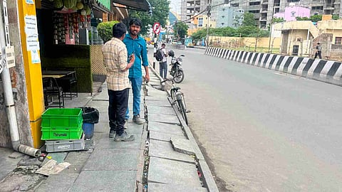 Cracked and dislodged paver blocks on the pavement at Kandhanchavadi in Perungudi