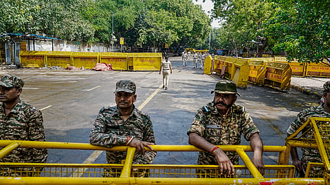 Security personnel keep a vigil near the protest site of Jantar Mantar, in New Delhi, Sunday, July 26, 2026