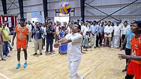 State Minister V Sampath Kumar plays volleyball after inaugurating new sports facilities at Nehru stadium 