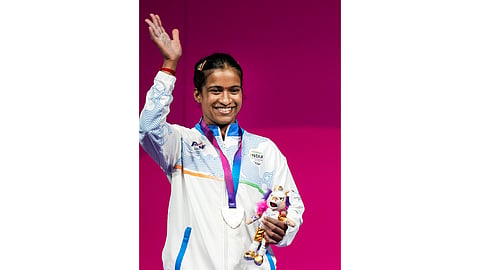 India's Gyaneshwari Yadav clinches a silver medal in the women's 53kg weightlifting final at the 23rd Commonwealth Games, in Glasgow, Scotland, Monday