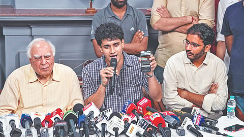 Rajya Sabha MP Kapil Sibal, CJP spokespersons Saurav Das and Ashutosh Ranka at a press meet in New Delhi on Monday