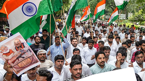 Indian Youth Congress (IYC) supporters during a protest rally from IYC headquarters to Jantar Mantar against Union Home Minister Amit Shah