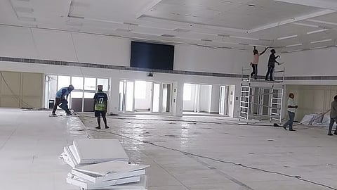 Workers engaged in renovation at Namakkal Kavignar Maligai