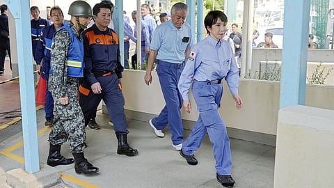 Japan's Prime Minister Sanae Takaichi visits an evacuation center in Hikawa, southern Japan.