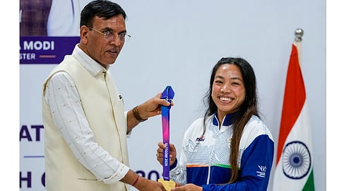 Union Minister Mansukh Mandviya felicitates Commonwealth Games 2026 gold medalist in Weightlifting, Women's 48kg category, Mirabai Chanu during an event, in New Delhi