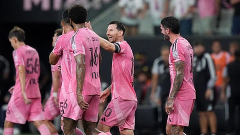 Inter Miami forward Lionel Messi (10) celebrates with teammates after scoring his side's third goal during the first half of a Leagues Cup soccer match against Atletico de San Luis in Miami.