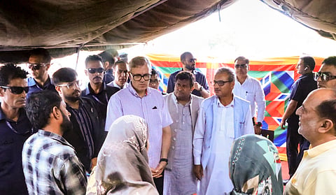  Jammu and Kashmir Chief Minister Omar Abdullah interacts with people during an inspection at the flood affected areas, in Rajouri, Jammu and Kashmir