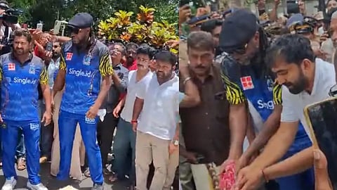 Chris Gayle pays floral tribute at Oommen Chandy’s tomb in Kottayam