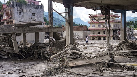 Destroyed buildings and structural ruins filled with mud and debris in the aftermath of devastating flash floods, at Devighat, in Nuwakot district, Nepal.