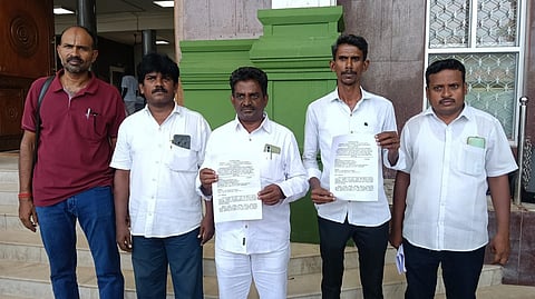 Environmental activists at Karur Collectorate on Monday