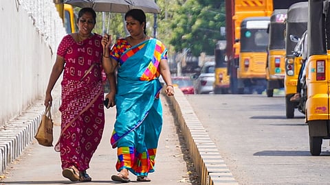 Women's walking in the scorching summer in Chennai.
