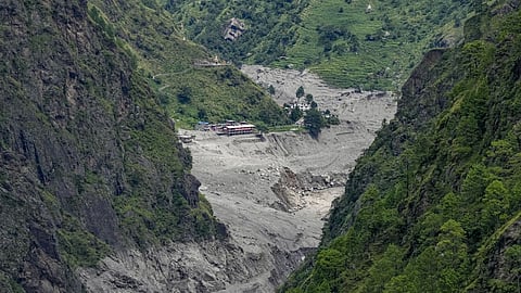 A view of the heavy damage and massive landslide debris following floods caused by incessant rains in the mountainous Rasuwa district of Nepal.