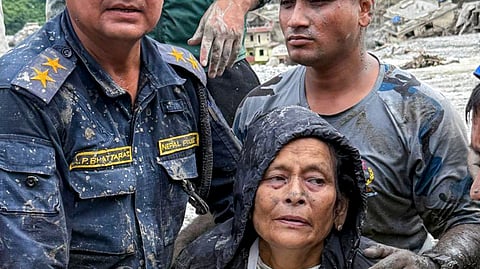 Nepalese army and police personnel rescue during a search and rescue operation in the aftermath of the recent flash floods, at Vidur, in Nuwakot district, Nepal.